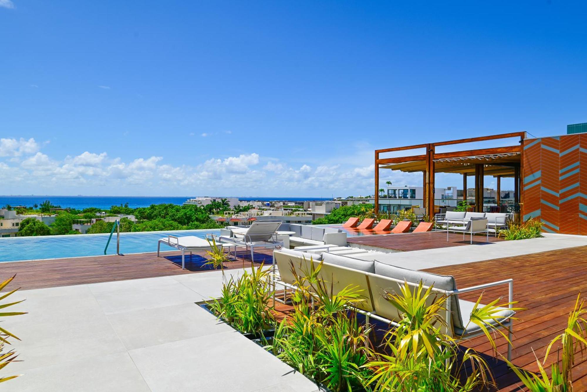 Aloft Playa Del Carmen Hotel ภายนอก รูปภาพ Rooftop pool at the Grand at Moon Palace