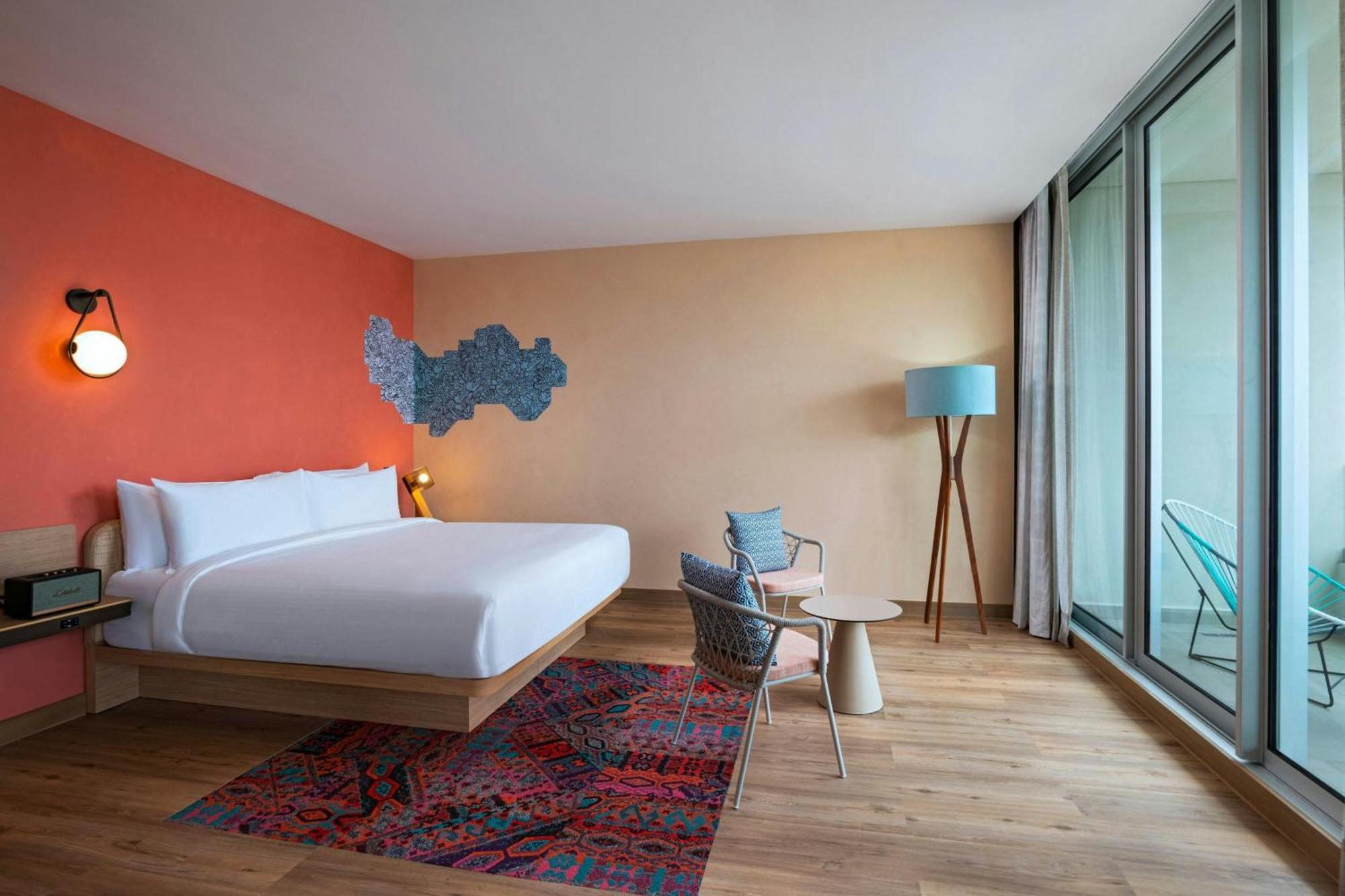 Aloft Playa Del Carmen Hotel ภายนอก รูปภาพ A room at the hotel