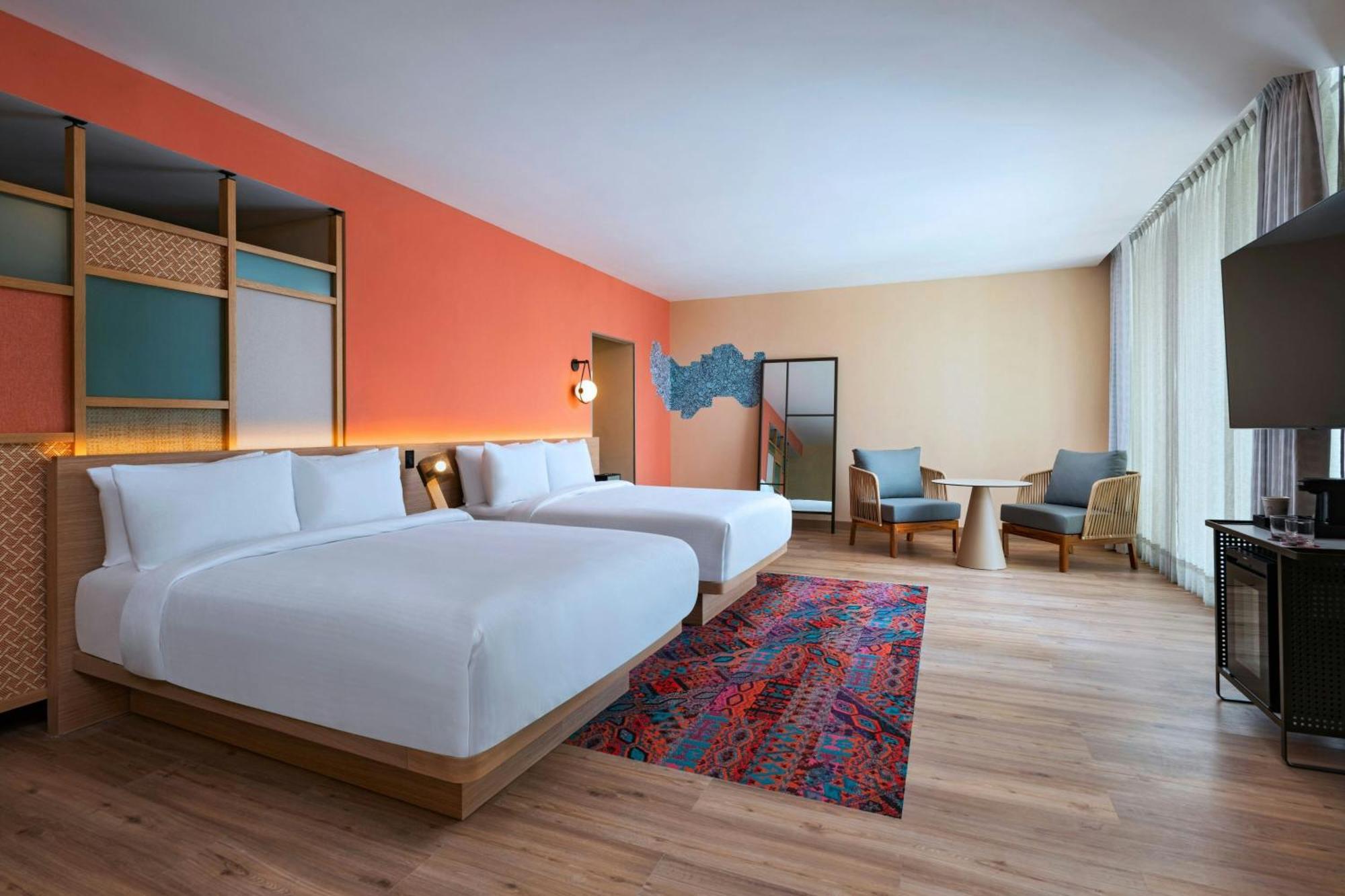 Aloft Playa Del Carmen Hotel ภายนอก รูปภาพ A room at the hotel