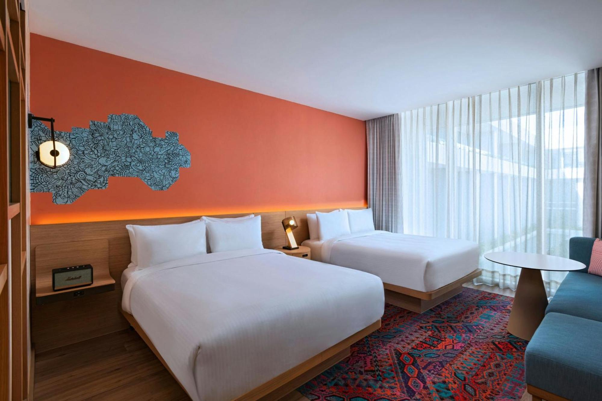 Aloft Playa Del Carmen Hotel ภายนอก รูปภาพ A room at the hotel