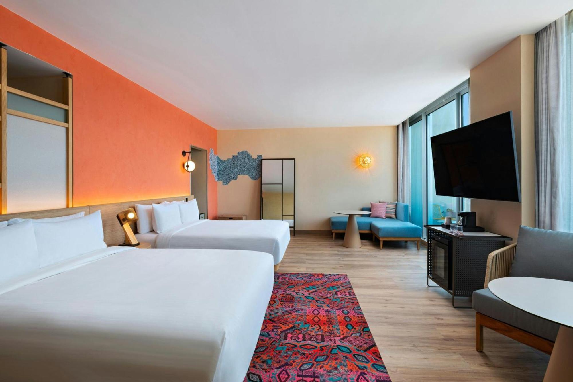 Aloft Playa Del Carmen Hotel ภายนอก รูปภาพ A room at the hotel